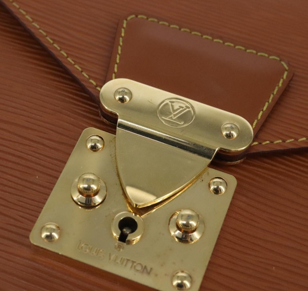 Louis Vuitton Dragonne Clutch